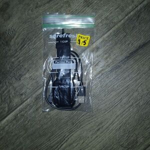 Black Smart Watch with USB Charging Cable in Clear Portion Pack